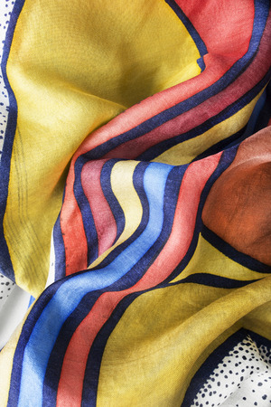 Colorful crumpled silk closeup as a backgroundの写真素材