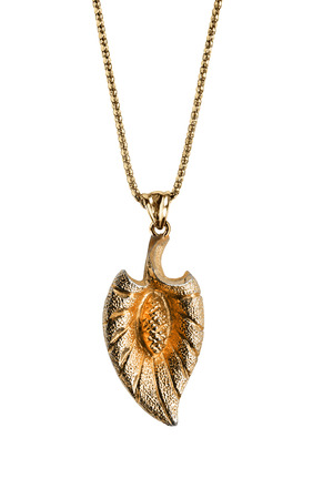 Golden pendant on a chain isolated over whiteの写真素材