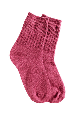 Red wool knitted socks isolated over whiteの写真素材