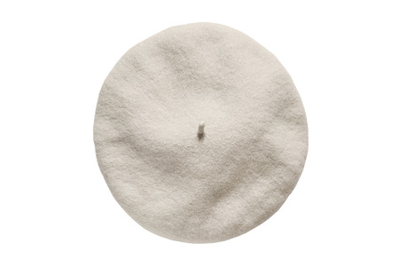 Beige elegant wool beret isolated over whiteの写真素材