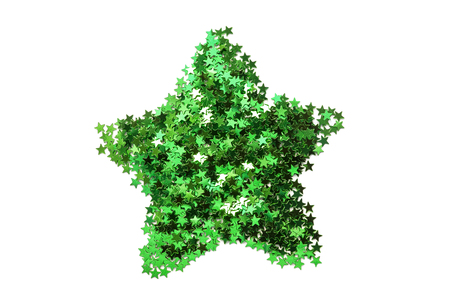 Green metallic confetti in the shape of a star isolated over whiteの写真素材