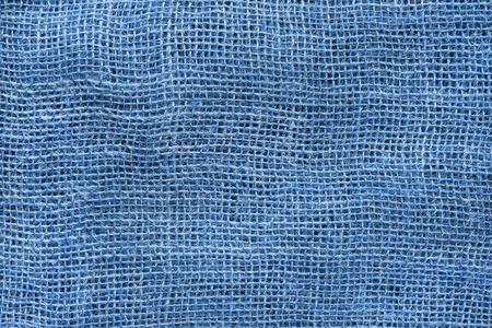 Blank blue canvas closeup as a backgroundの写真素材