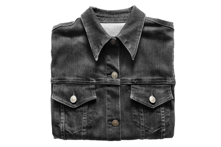 Folded black denim shirt on white backgroundの写真素材