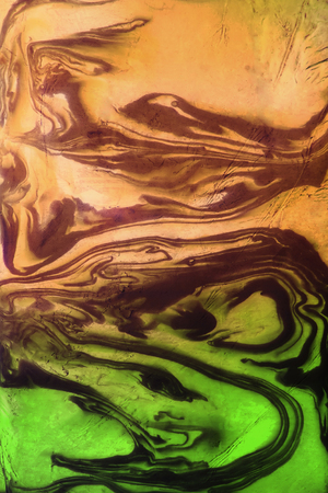 Abstract green and yellow stained glass as a backgroundの写真素材