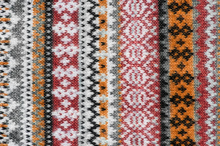 Colorful wool knitting closeup as a background