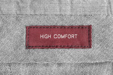 Clothes label lettered high comfort on gray woolの写真素材