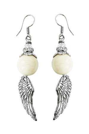 Pair of pearl earrings on white backgroundの写真素材