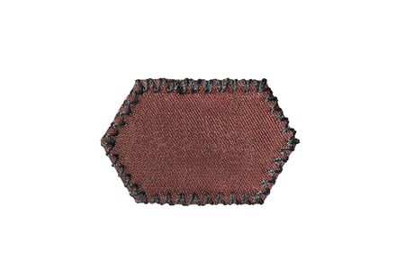 Blank brown clothes label isolated over whiteの写真素材
