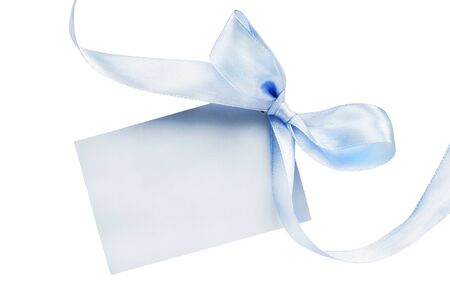 Blank greeting card with blue ribbon isolated over whiteの写真素材