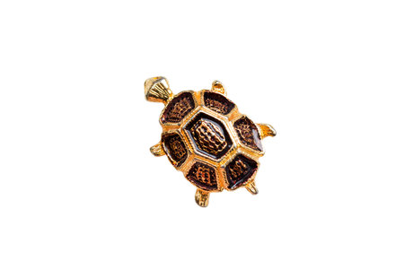 Decorative golden turtle on white backgroundの写真素材