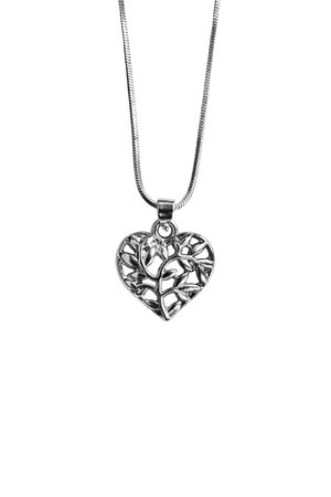 Silver heart pendant hanging on a chain isolated over whiteの写真素材