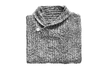 Gray wool knitted sweater folded on white backgroundの写真素材