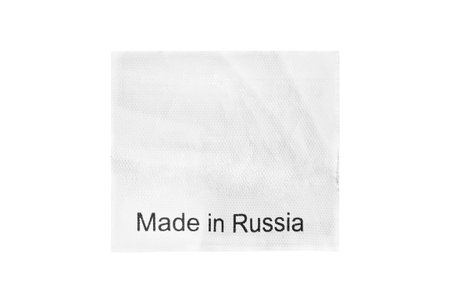 Clothes label lettered made in Russia isolated over white
