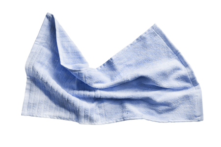 Blue crumpled terry towel on white backgroundの写真素材
