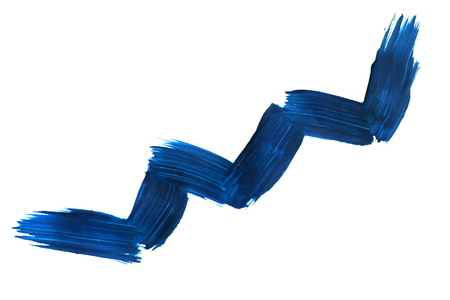 Blue paint zigzag brush stroke on white backgroundの写真素材