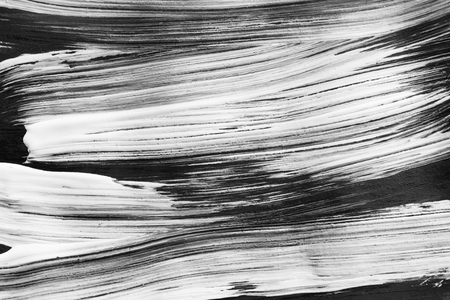 Black and white abstract acrylic painting closeup as a backgroundの写真素材