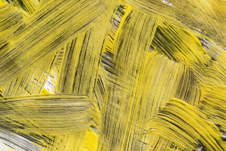 Yellow and black abstract acrylic painting as a backgroundの写真素材