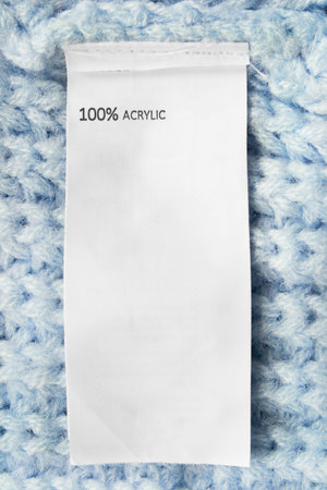Composition clothes label says 100% acrylic on knitted background
