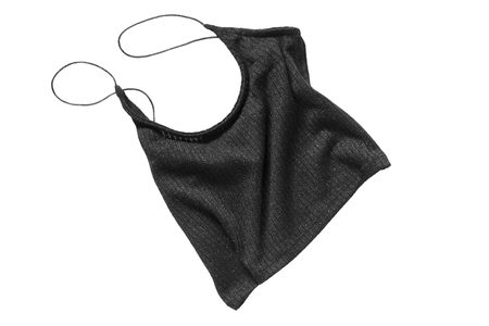 Crumpled black knitted crop top on white backgroundの写真素材