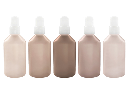 Palette of five liquid concealer shades on white backgroundの写真素材