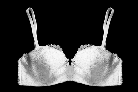 White lacy push up bra on black backgroundの写真素材