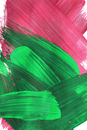 Green and pink abstract painting on white as a backgroundの写真素材
