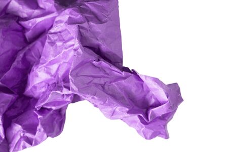 Crumpled purple paper on white as a backgroundの写真素材