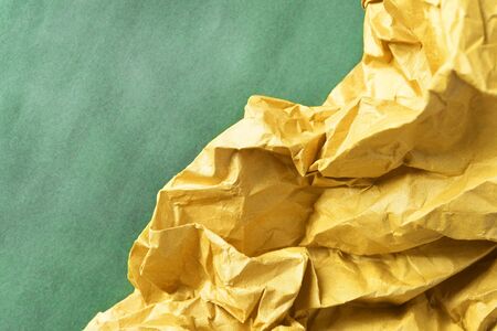 Yellow and green blank craft paper as a backgroundの写真素材
