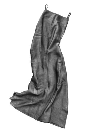 Dark grey long sleeveless crumpled dress on white backgroundの写真素材
