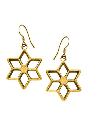Gold star shaped earrings isolated over whiteの写真素材
