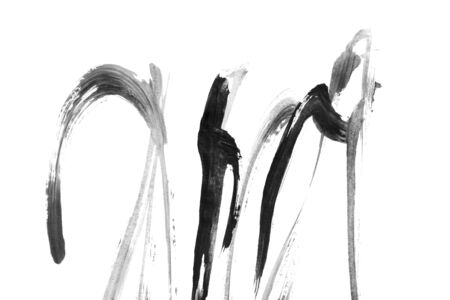 Black and white abstract paint strokes isolated over whiteの写真素材
