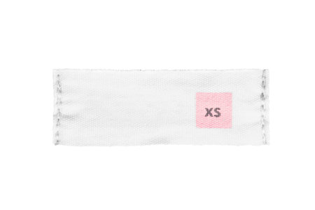 XS size textile clothing label isolated over white