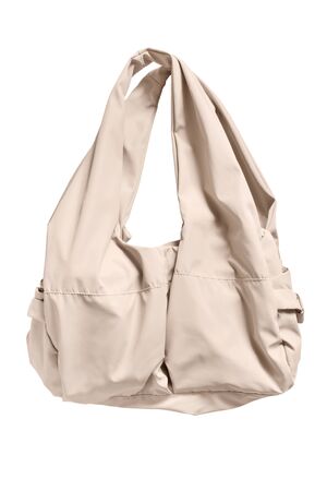 Beige textile sport shouder bag isolated over whiteの写真素材