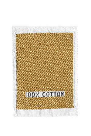 Textile clothing label says 100% cotton isolated over white