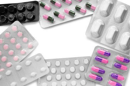 Group of medical pills blisters on white background