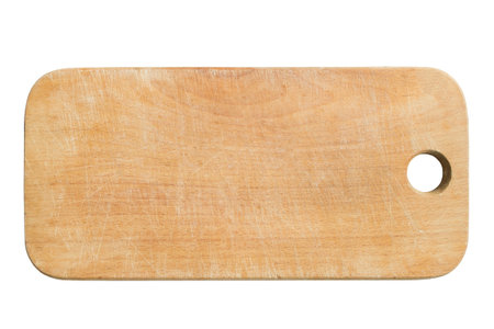 Old wooden cutting board isolated over white