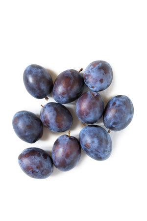 Fresh blue plums on white backgroundの写真素材