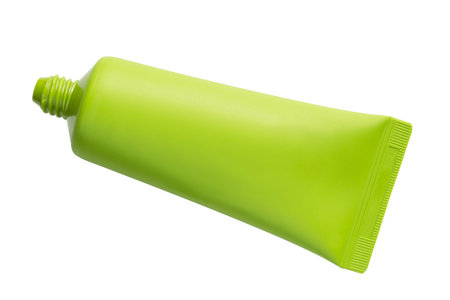 Blank green plastic open tube isolated over white