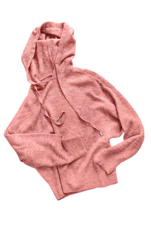 Pink knitted wool hoody isolated over whiteの写真素材