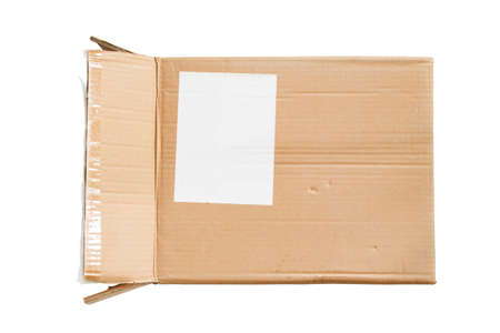 Open carton box with blank white label isolated over whiteの写真素材