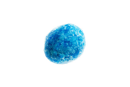 Blue sweet glazed nut candy on white background