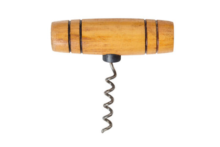 Old rusty corkscrew with wood handle isolated over whiteの写真素材
