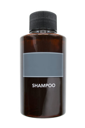 Small plastic shampoo bottle isolated over white