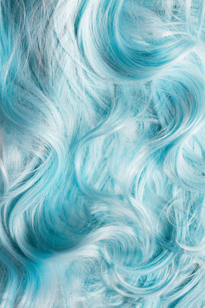 Pastel blue fair wavy hair closeup as a backgroundの写真素材