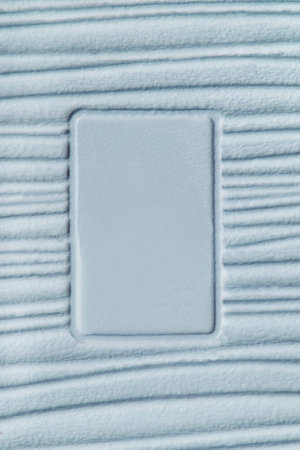 Blue ribbed rubber background with empty frame as a backgroundの写真素材