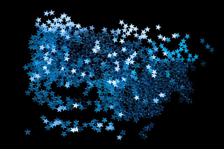 Blue metallic stars confetti on black background