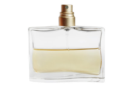 Half full perfume bottle isolated on white background