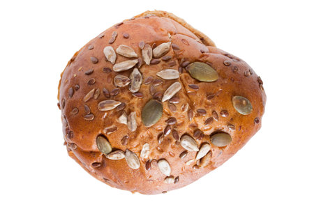 Fresh brown grain loaf isolated on white background