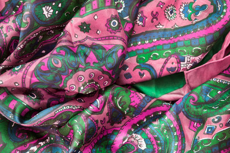 Colorful silk draped fabric closeup as a background
