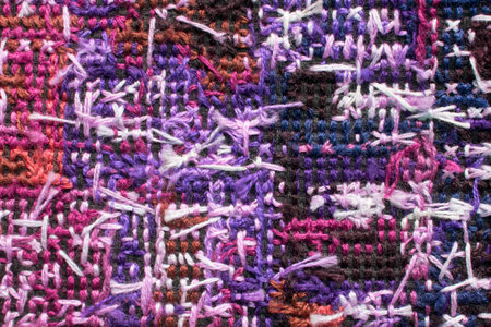 Abstract colorful embroidery back side as a background closeupの写真素材